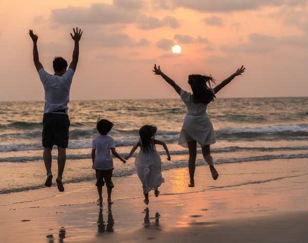-happy-family-enjoy-vacation-beach