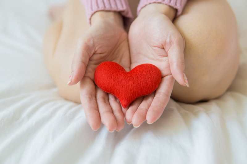 red-heart-on-hand